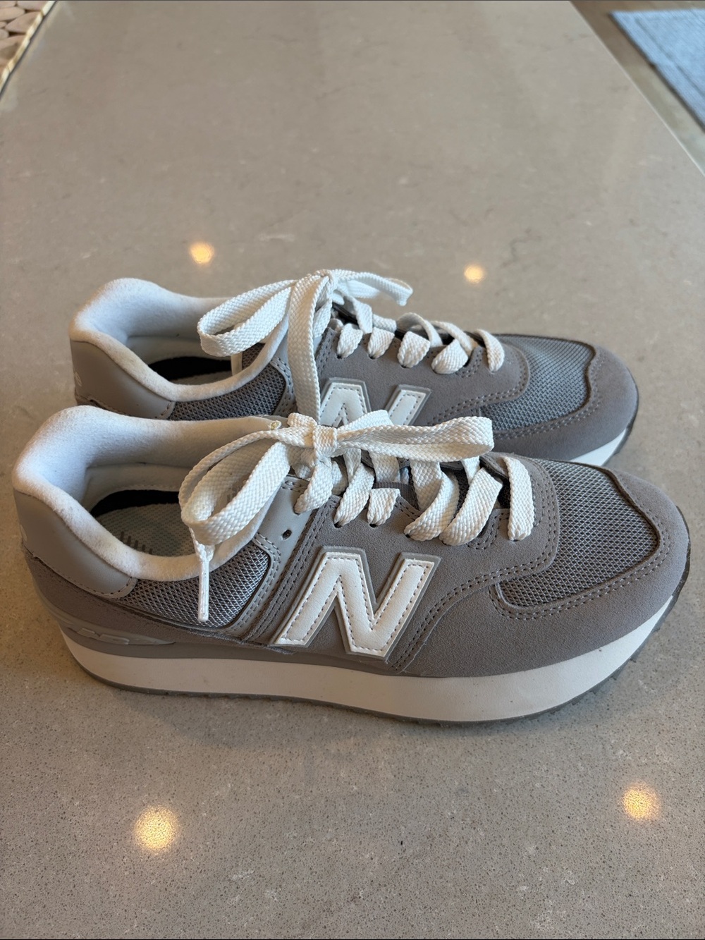 New Balance Women’s Gray and White 574 Platform Sneaker